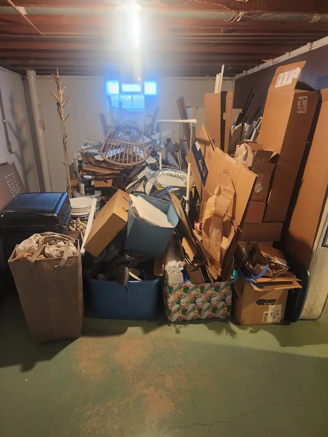 Roll-off dumpster container at job site for 2 Yard Dumpster Rental in Lyndhurst